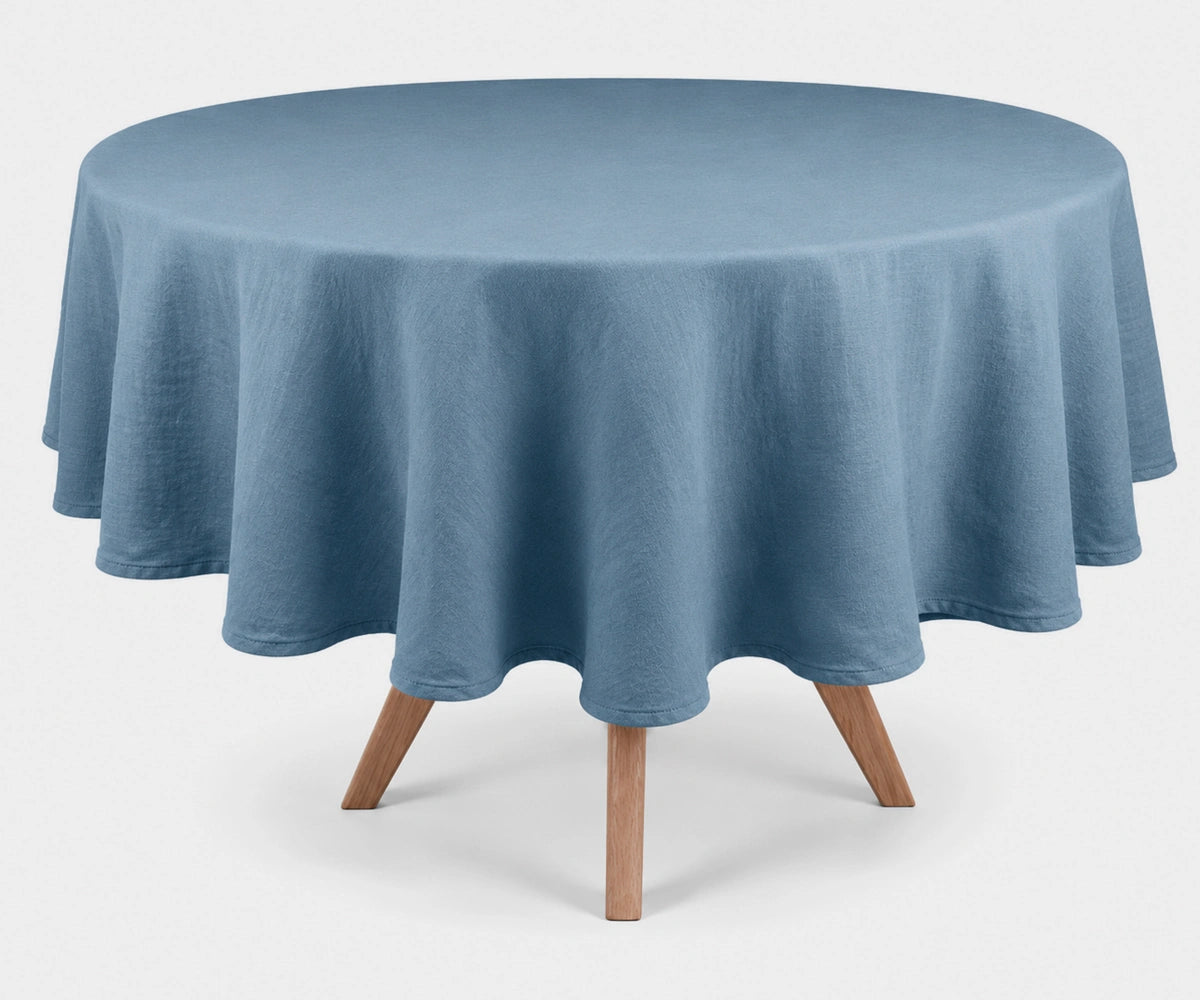 Dusty Blue round linen tablecloth crafted from 100% washed linen, reusable table cover for weddings, dining rooms, holiday gatherings, and everyday entertaining