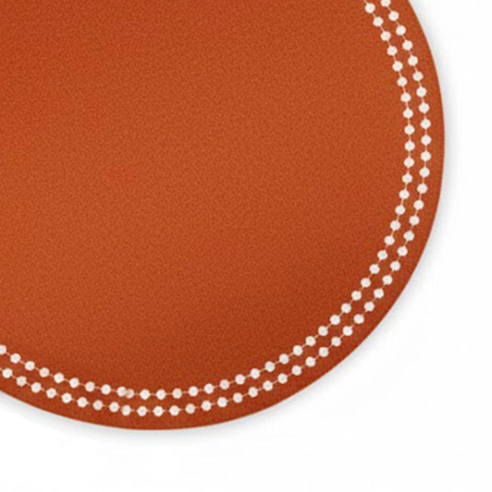 Round terracotta cotton placemats for farmhouse dining décor.