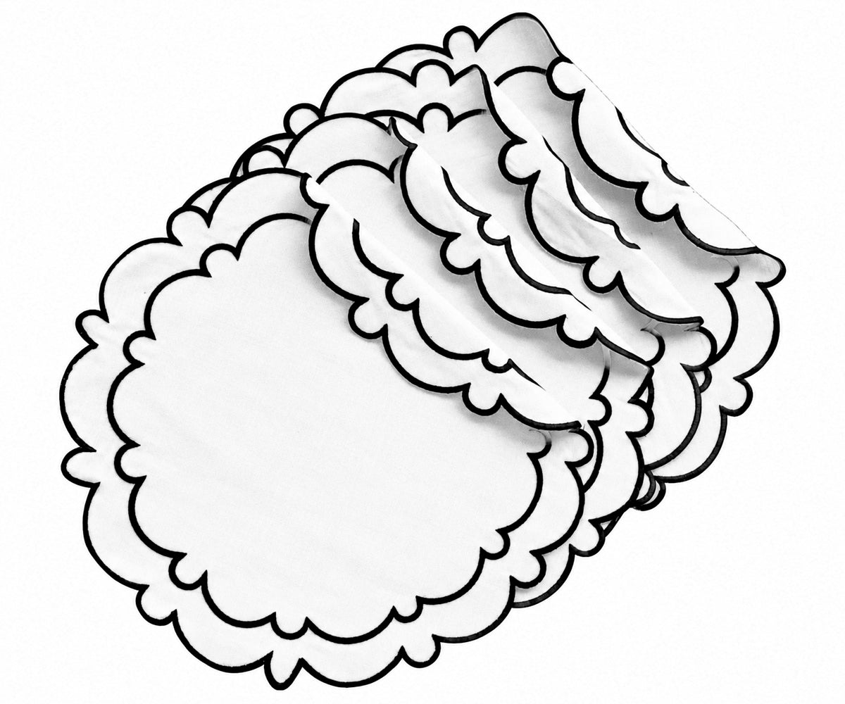 Black cotton round placemats with scalloped edges and black-and-white design, available in 15-inch and 17-inch sizes for dining table decor
