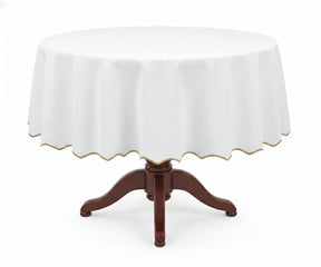 White round cotton tablecloth accented with a soft beige scalloped edge, crafted from 100% cotton for durability and a graceful drape. This white tablecloth with beige trim complements farmhouse and neutral interiors, perfect for dining tables, daily use, brunches, holiday décor, and elegant gatherings.