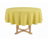 butter yellow tablecloth crafted from 100% cotton for a soft, natural feel. The cheerful yellow tone adds warmth to your table.