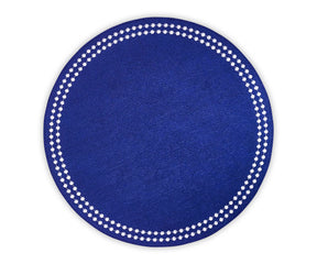 Set of 4 embroidered blue and white cotton placemats styled for a table setting