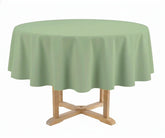 Plain round sage green tablecloth with a smooth finish, elegant table cover for everyday dining and special occasions