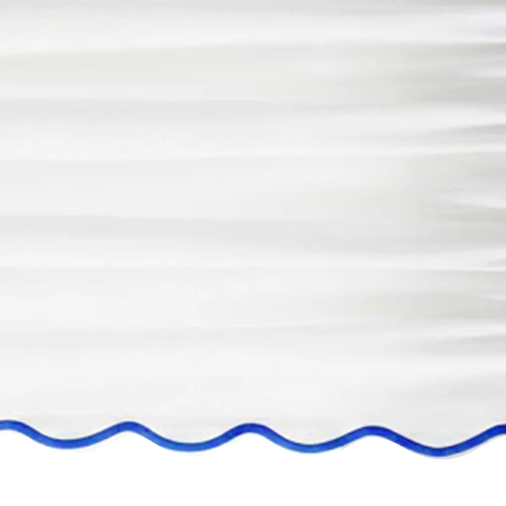White scalloped curtain panel with royal blue trim - Close up