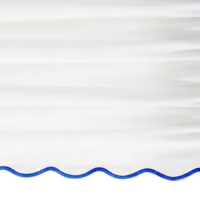 White scalloped curtain panel with royal blue trim - Close up