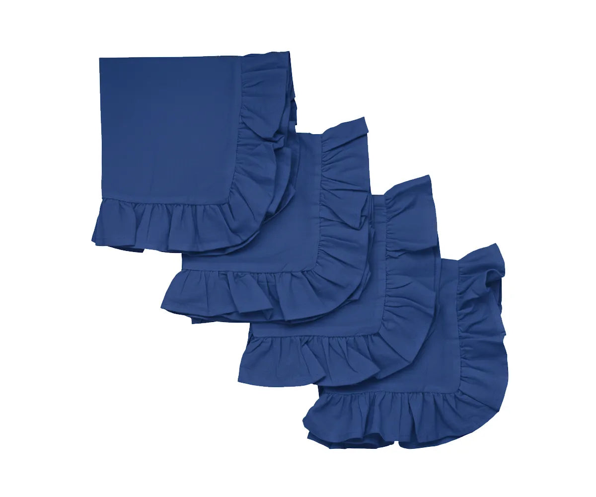 Royal blue ruffle edge cotton dinner napkins set on a dining table