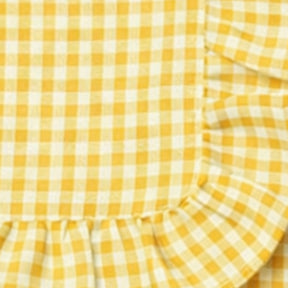 Cotton dinner napkin in yellow check pattern with ruffle design