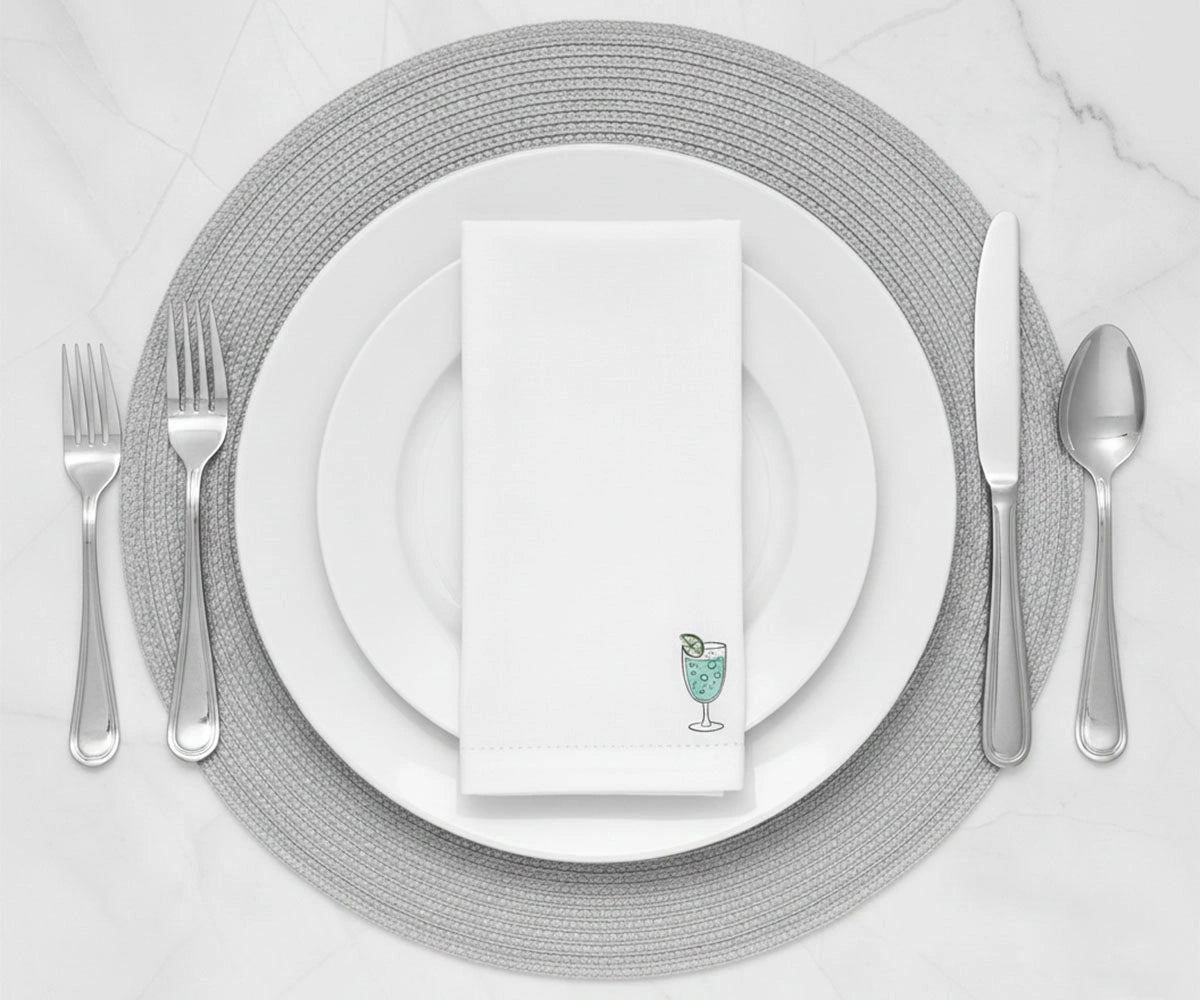 white cotton printed napkins featuring subtle drink illustration in the corner, soft washable cloth napkins designed for home bar styling, dinner gatherings, and casual entertaining