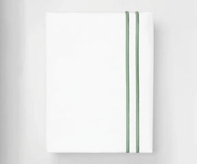 Neatly folded white cotton flat sheet featuring a decorative sage green double-line embroidered border.