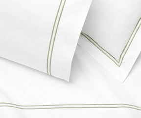 sage green cotton percale flat sheet embroidered border breathable calming bedroom decor luxury bedding