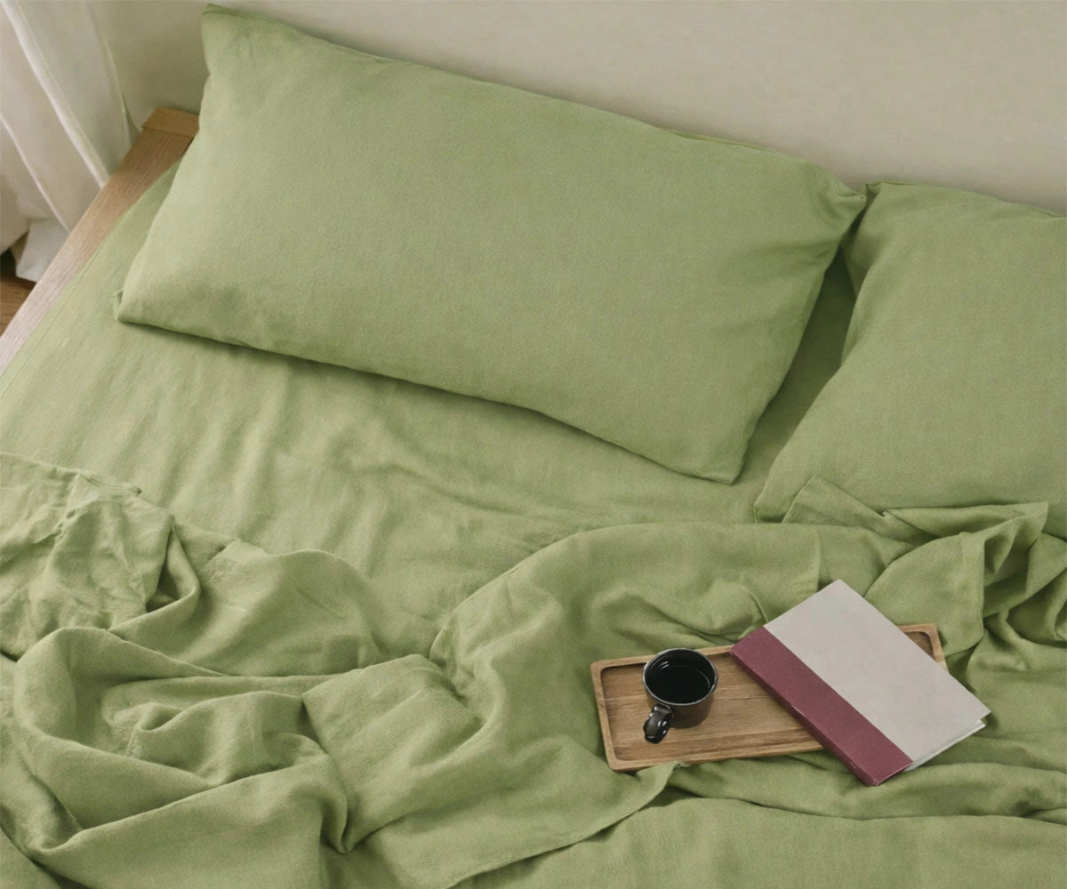 Sage green linen bed sheets set made from 100% pure linen with breathable fabric and deep pocket fitted sheet