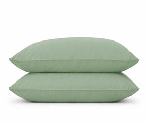 Set of 2 sage green pillowcases in a soft eucalyptus tone, perfect for  bedroom decor and earthy-themed minimalist bedding.