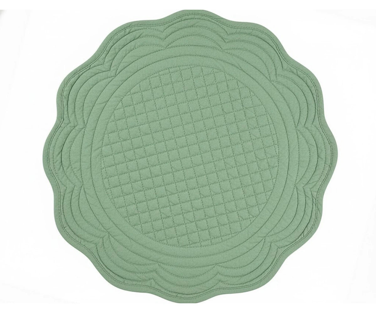 Sage green quilted cotton round placemat with scalloped edge for calming farmhouse and modern table décor