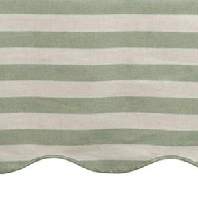 Sage Green and white striped awning with scalloped edge