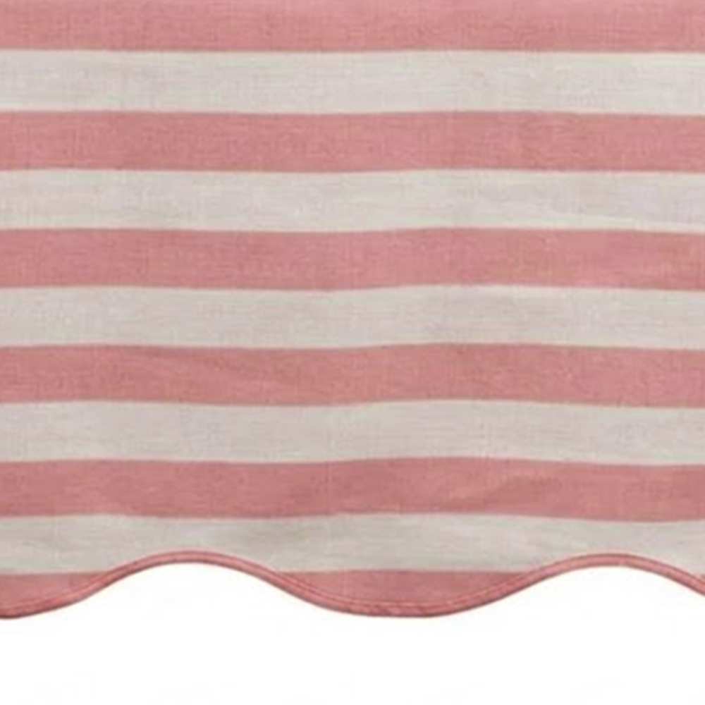 Blush Pink and white striped awning with scalloped edge
