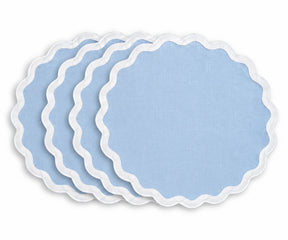 Soft light blue cotton dining placemat with contrasting white scalloped border, reusable table accessory for coastal, beach house, cottage, farmhouse, and relaxed dining table decor