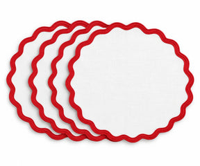 Solid white cotton placemat with red scalloped edge trim, decorative fabric table mat for dining tables, festive meals, holiday gatherings, family dinners, and everyday home decor