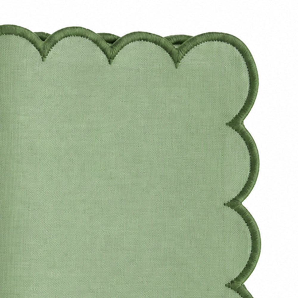 Sage green cotton dinner napkin with scalloped edges for elegant table setting