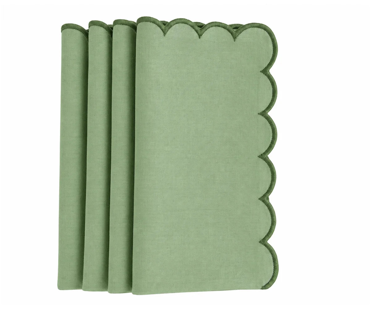 Sage green cotton dinner napkin with scalloped edges for elegant table settings and everyday dining.