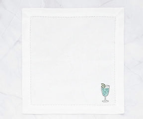 modern printed cotton napkins with minimalist cocktail glass motif on crisp white fabric, reusable cloth napkins ideal for cocktail parties, brunch tables, and contemporary dining décor