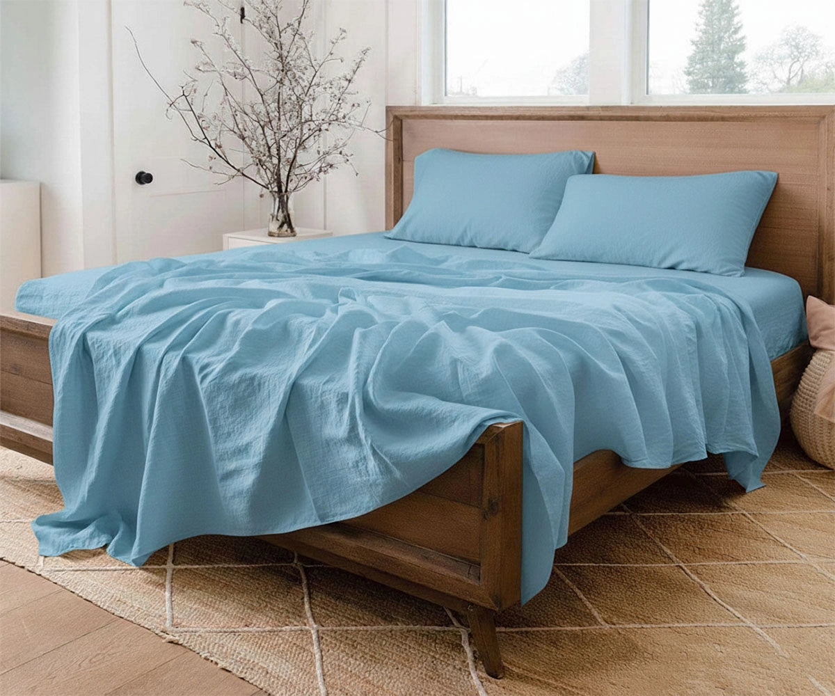 Sky blue linen bed sheet set crafted from breathable pure linen for fresh, airy comfort.