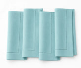 Sky blue 100% cotton hemstitch cloth napkins with elegant stitched border, reusable washable dinner napkins for weddings, restaurants, Thanksgiving, parties, and everyday dining, available in 18x18, 20x20, and 22x22 inch sizes.