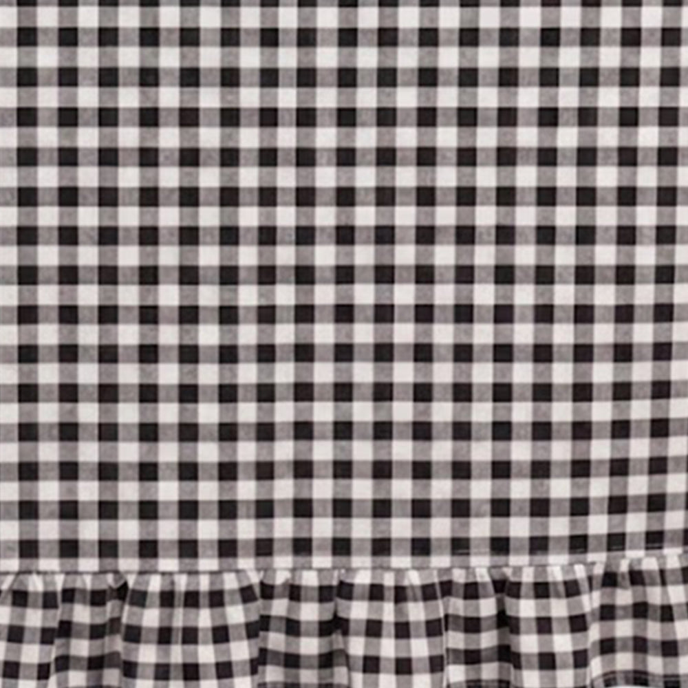 Cotton gingham fabric sample displaying lightweight weave ideal for everyday table use