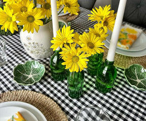 Black tablecloths, when paired with metallic or bright-colored elements, can create a visually stunning and memorable table setting.