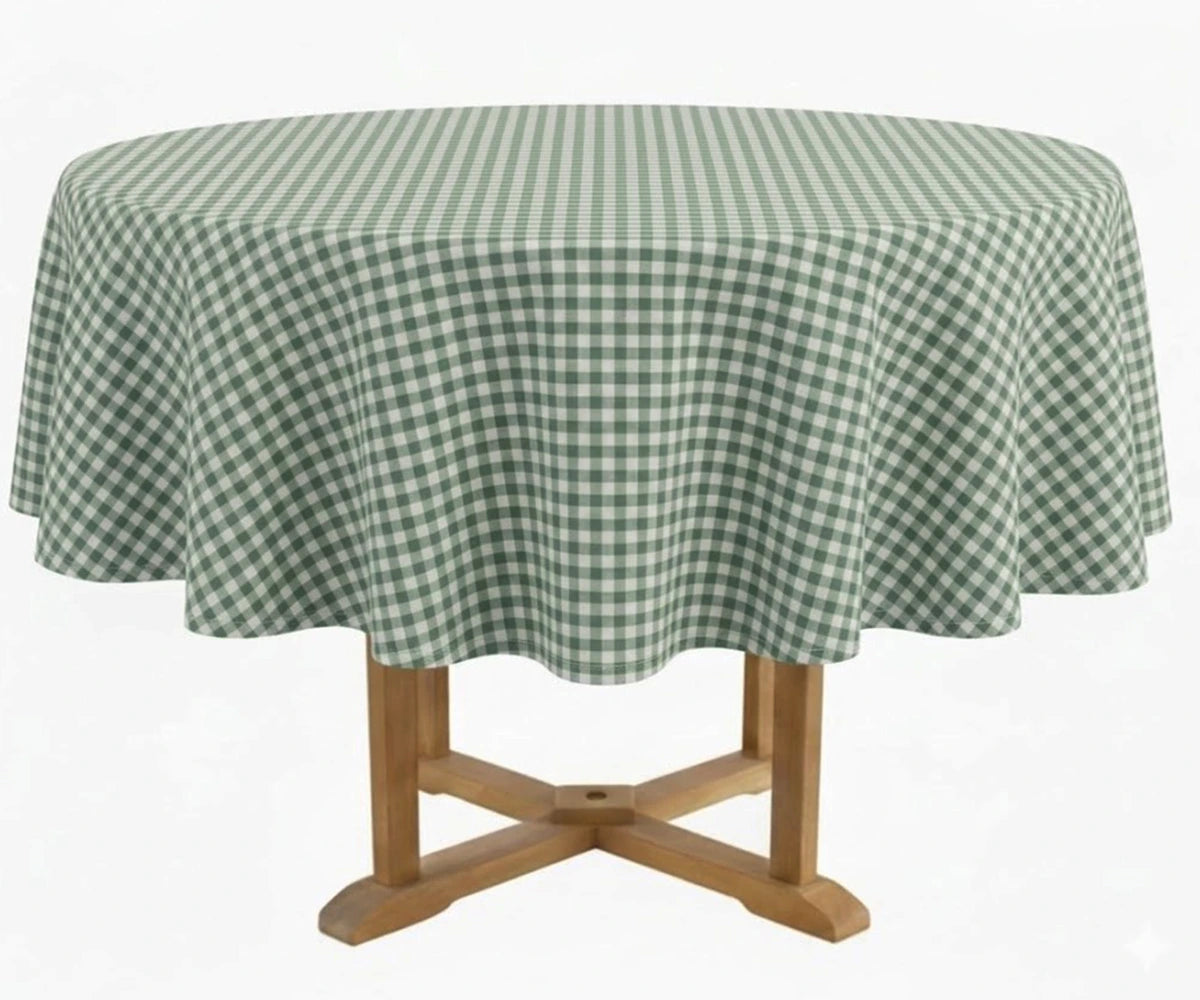 Sage green checked round cotton tablecloth styled on a dining table with a clean and classic look