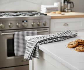 Small checkered cotton towel with classic grid pattern for kitchen use