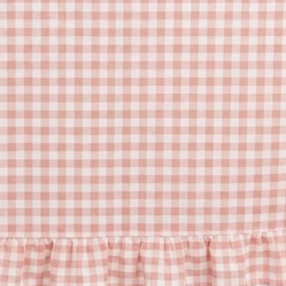 Texture view of farmhouse style gingham tablecloth fabric with visible check pattern detail