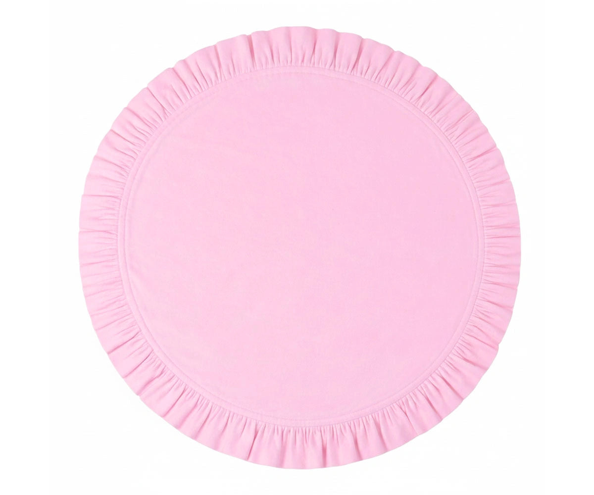 Pink round cotton ruffle placemat, decorative dining accessory.