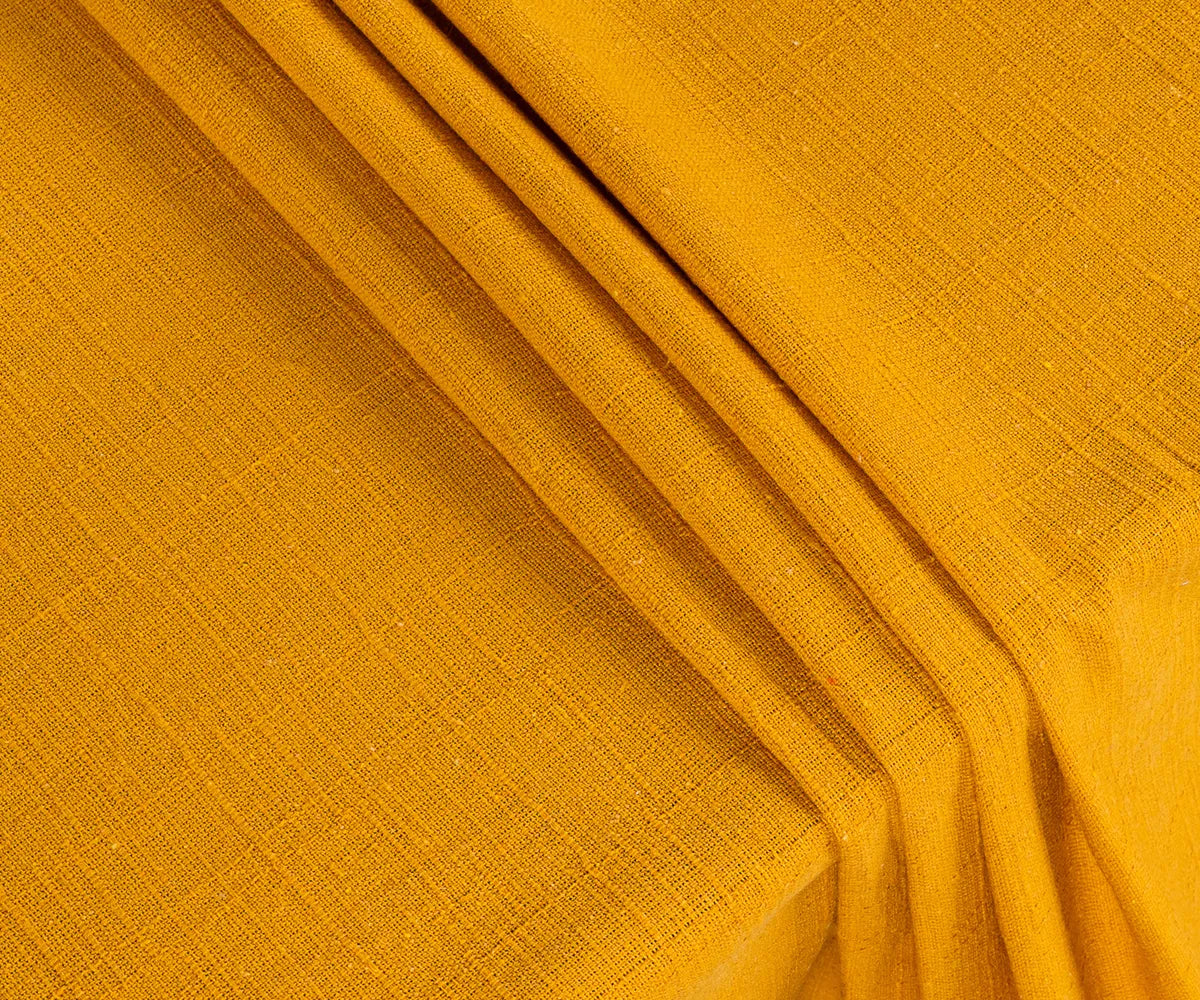 Close-up of soft cotton fabric of yolk rectangle tablecloth
