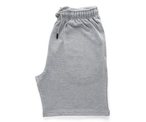 Close-up view of men's grey shorts made with soft-touch cotton fabric, suitable for sensitive skin