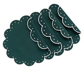 Holiday-themed scalloped edge placemats featuring festive patterns and warm seasonal tones
