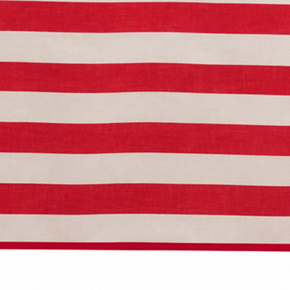 A close-up of a striped textile or fabric pattern with alternating red and off-white horizontal bands.
