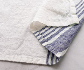 White linen towel: "Classic elegance in pristine white linen