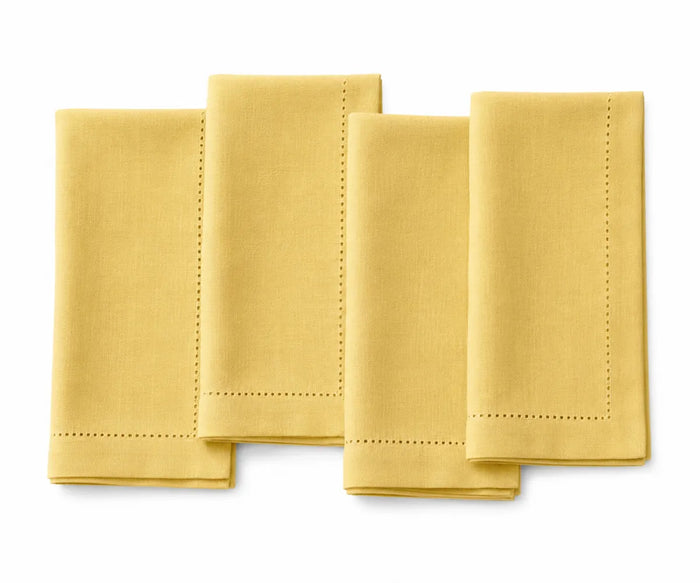 Bright sunflower yellow cotton hemstitch napkins, reusable washable cloth dinner napkins for weddings, festive table décor, parties, and everyday dining.