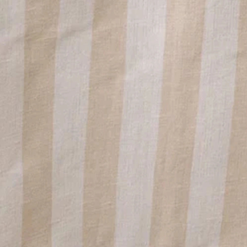 Close-up of beige striped tablecloth fabric