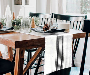 Crisp white table runner for a clean dining look.