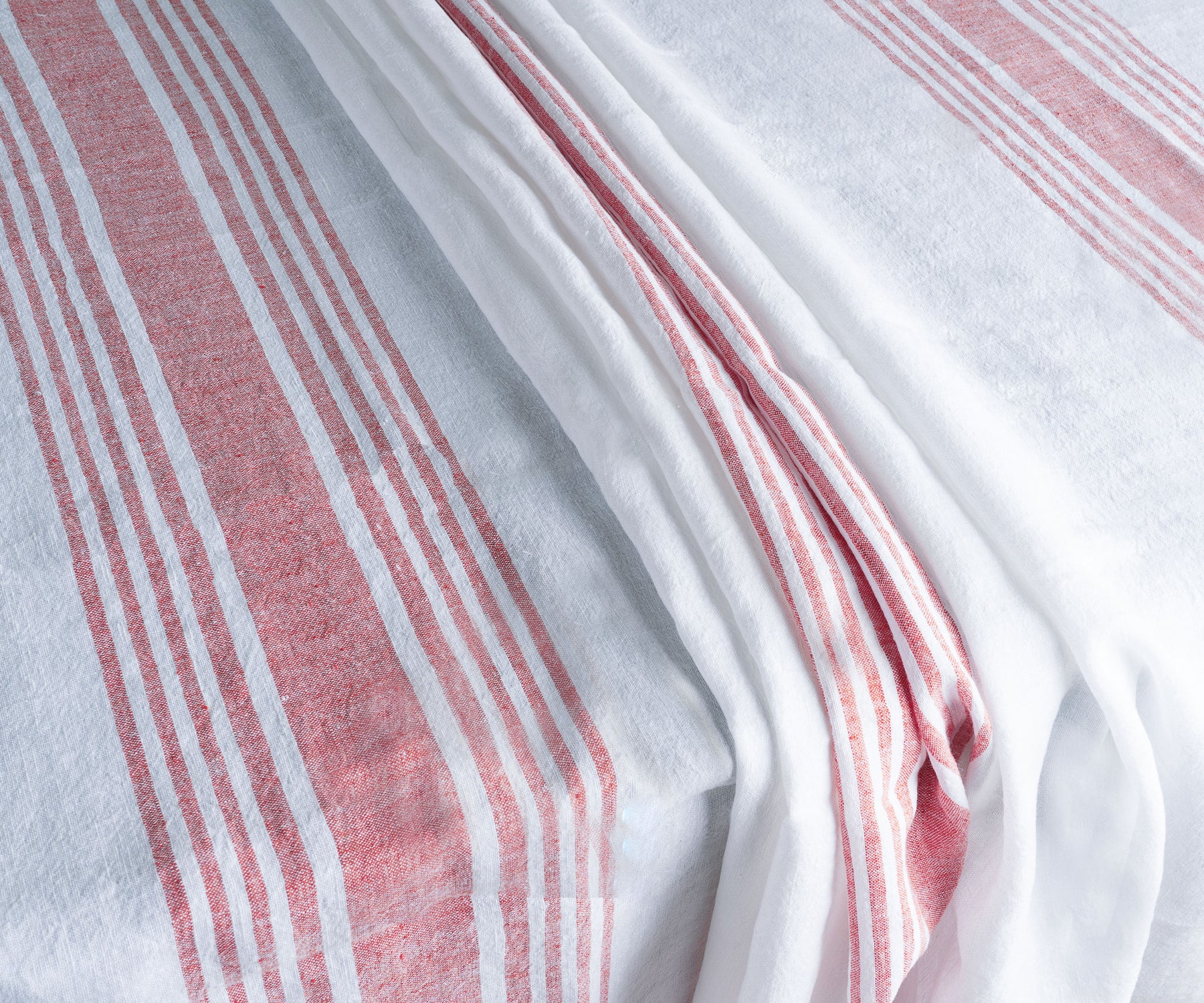 White linen tablecloth with a classic red stripe design