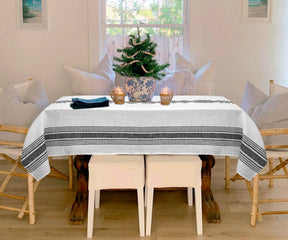 A refined white linen tablecloth for sophisticated gatherings.