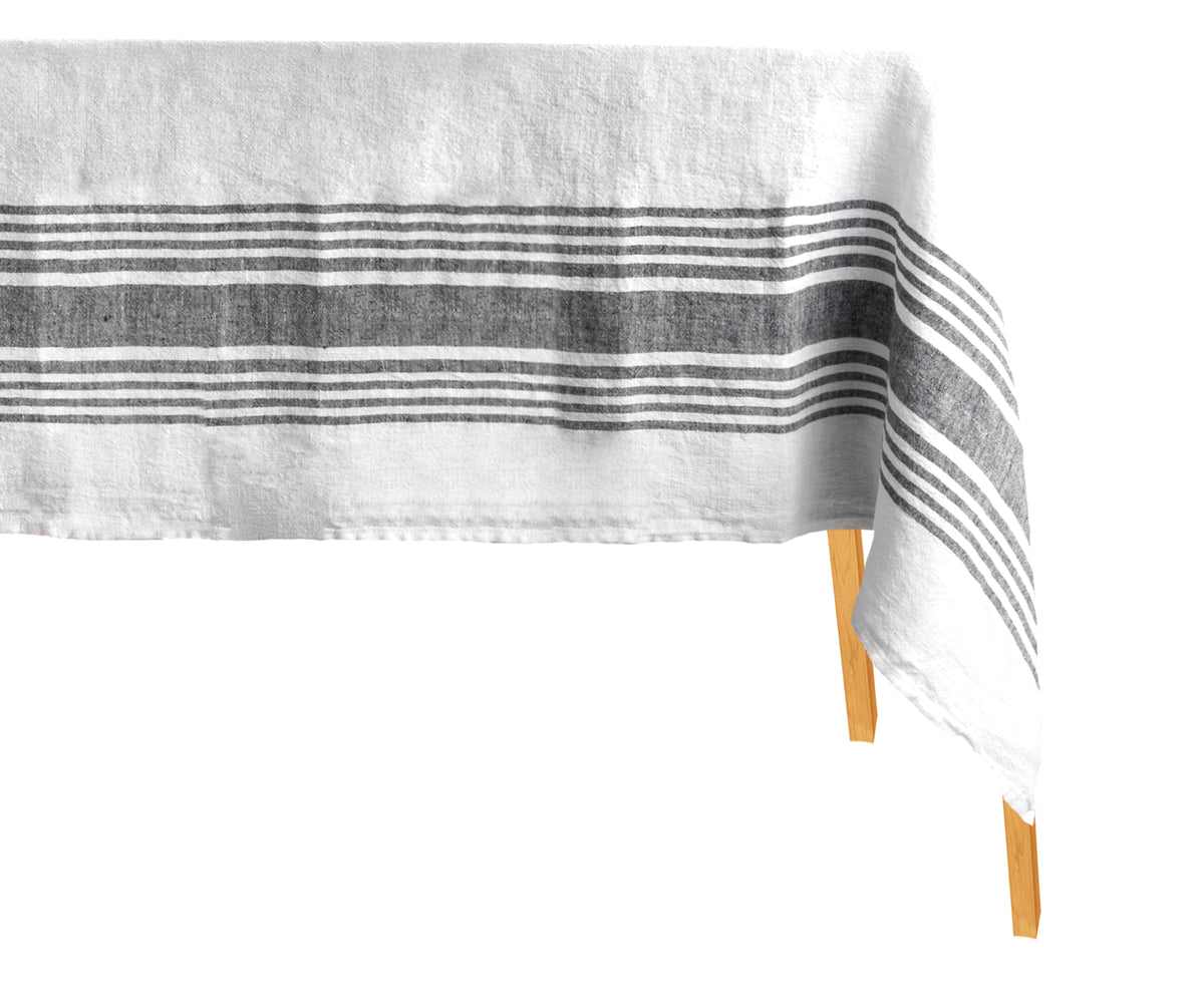White linen tablecloth with a minimalist striped pattern