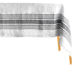 White linen tablecloth with a minimalist striped pattern