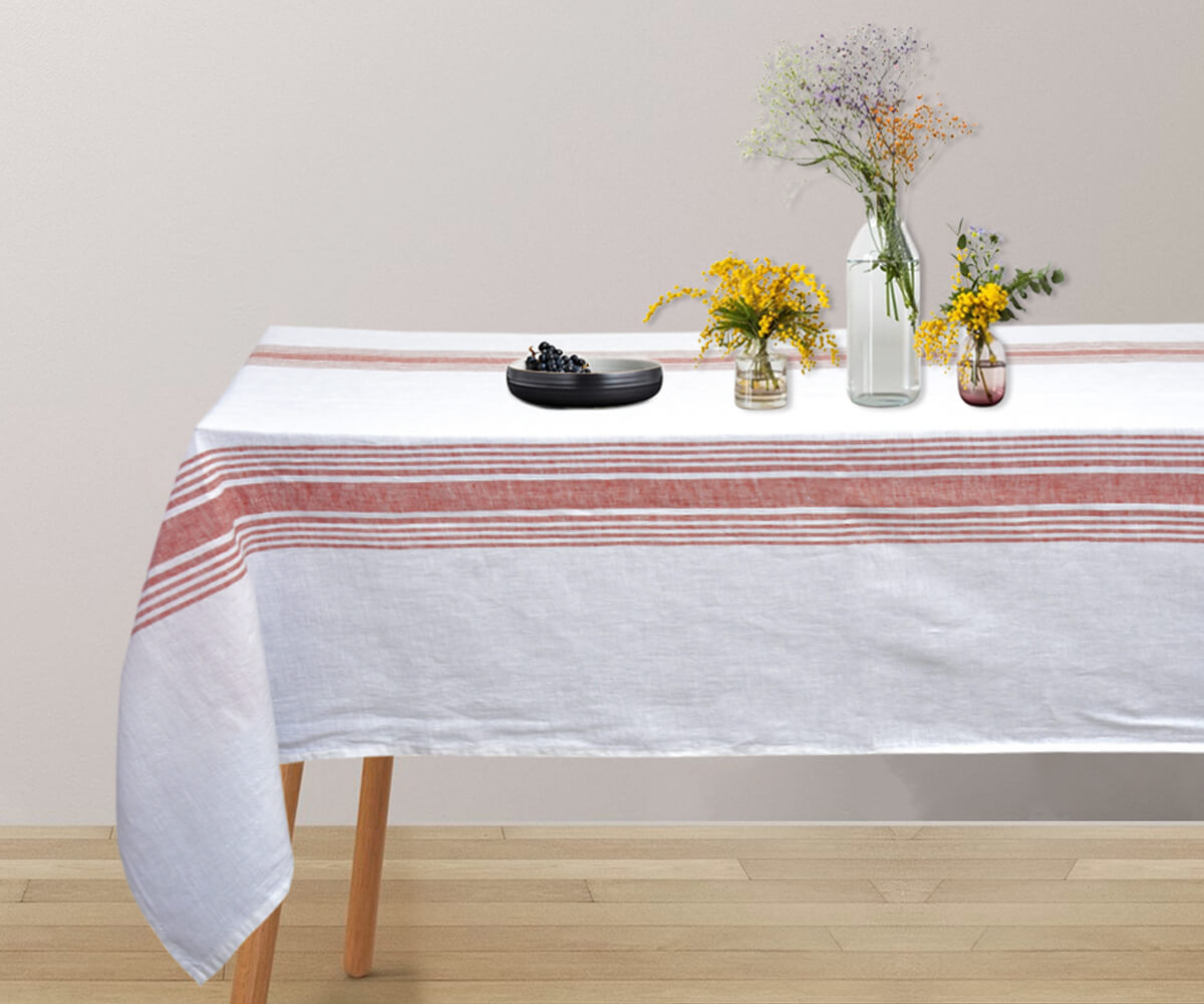 A red linen tablecloth for a bold and dramatic effect.