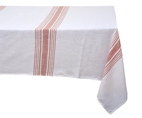 Elegant white linen tablecloth on a dining table