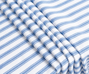 Close-up of baby blue and white striped fabric