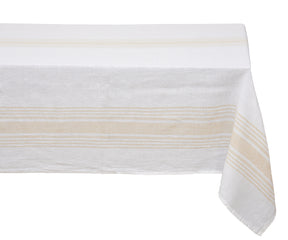 A pristine white linen tablecloth with subtle striping