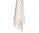 Black and white striped cotton throw blanket styled on a sofa, adding a clean and modern touch and strip blanket