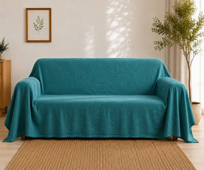 Teal cotton linen blend sofa slipcover adds a rich pop of color while helping keep couches protected from everyday messes and wear. Washable sofa cover and reusable couch protector 